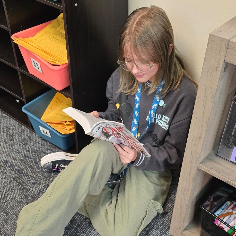 6th graders relax with good books.