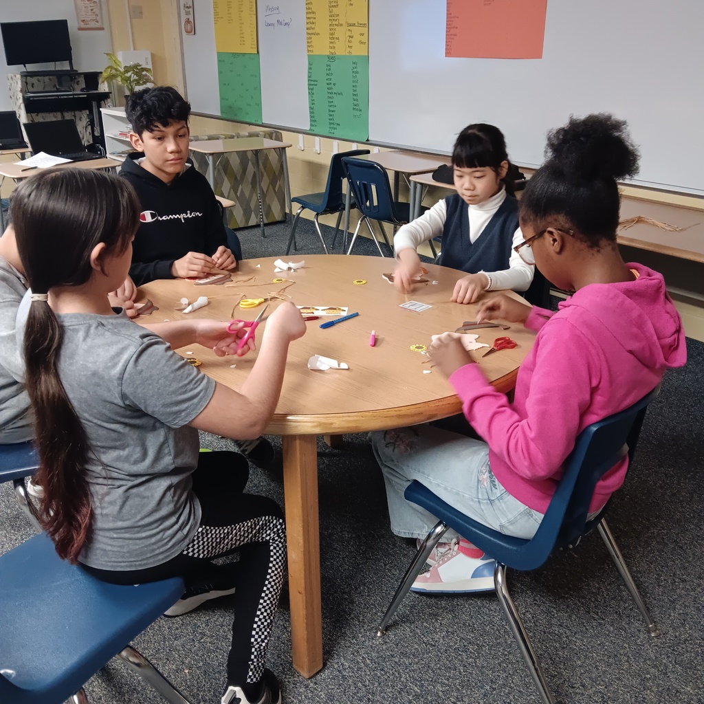 Having fun making scarecrows.