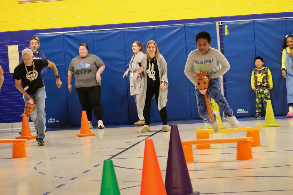 Stick horse race at May Overby