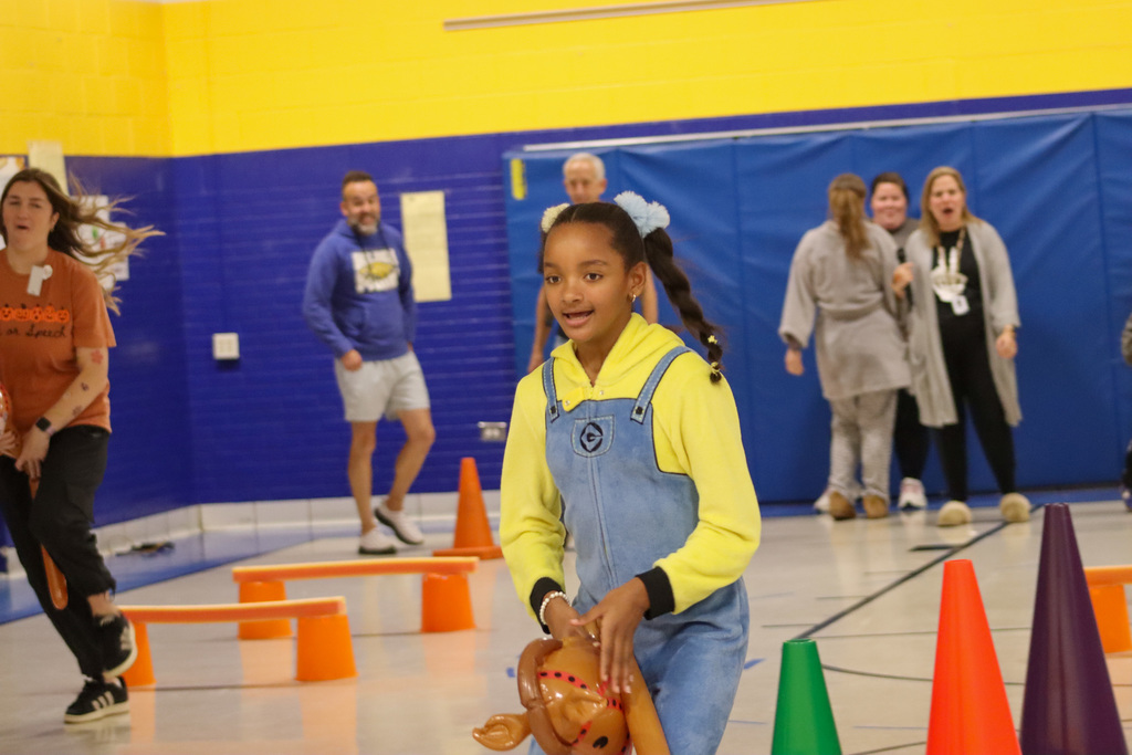 Stick horse race at May Overby