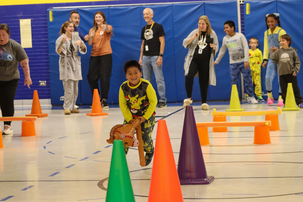 Stick horse race at May Overby