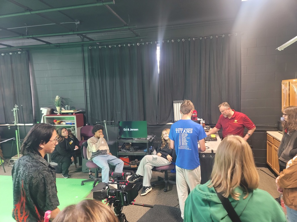 Student's Alta, DJ, and Addison learned some ways to use the green screen at NSU high school workshop!