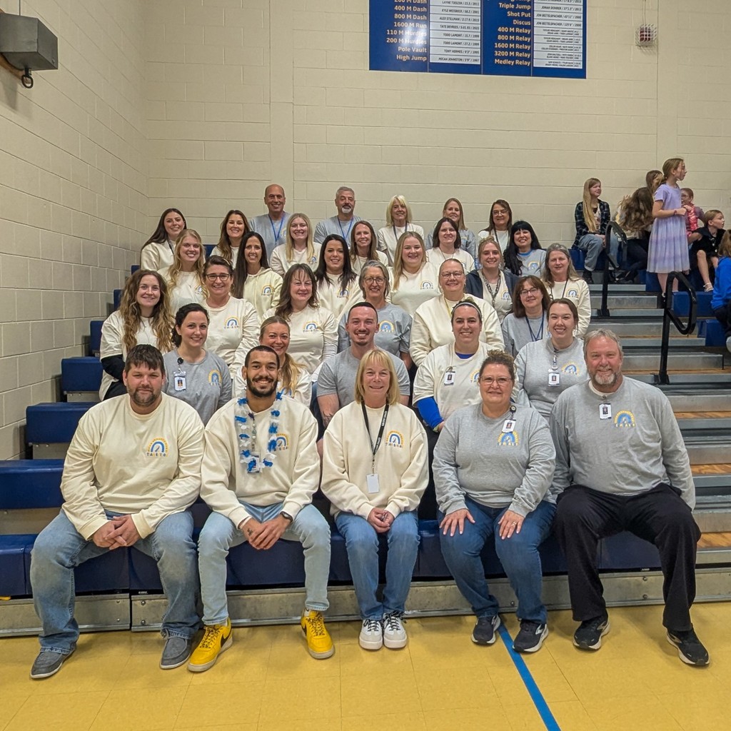 Holgate staff in matching shirts