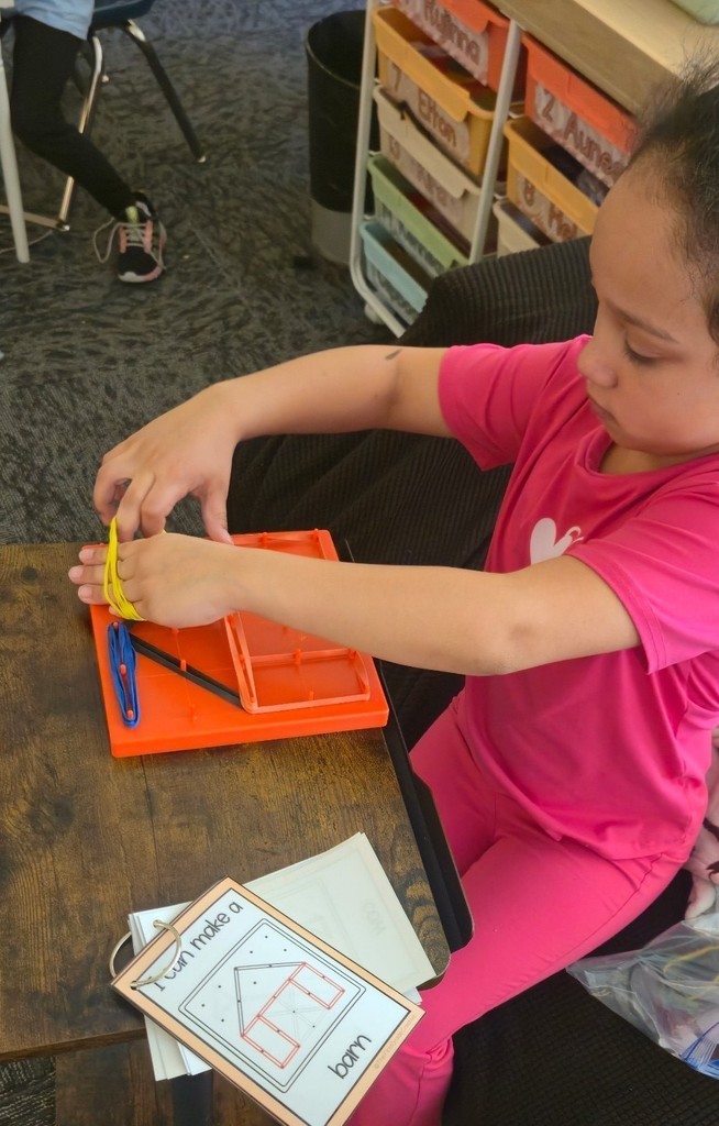 student using geoboard