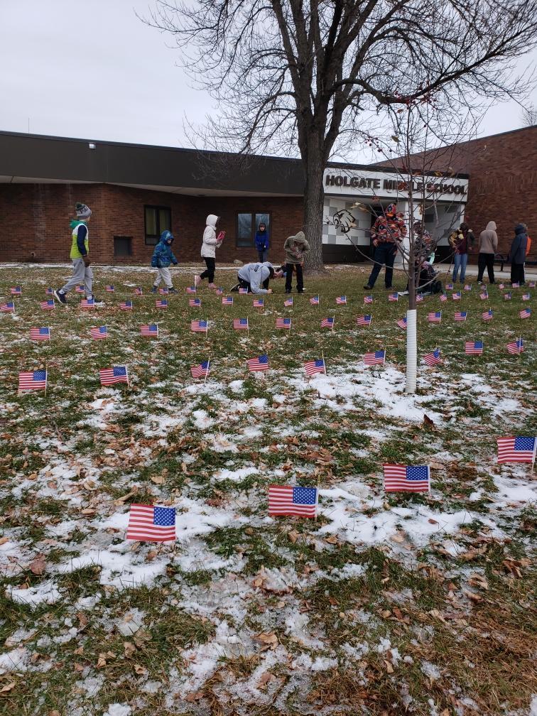 HMS students putting out flags