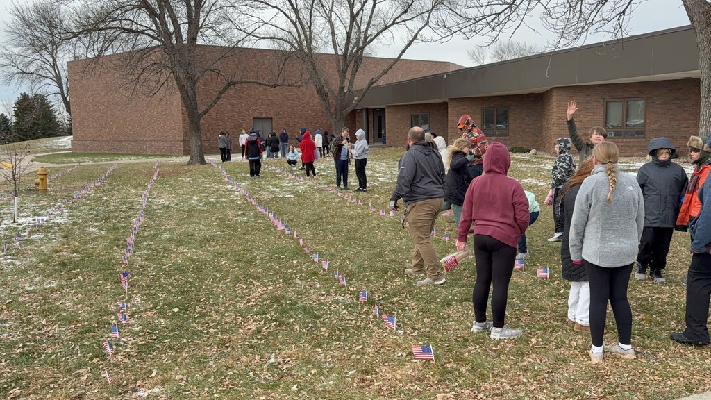 HMS students putting out flags