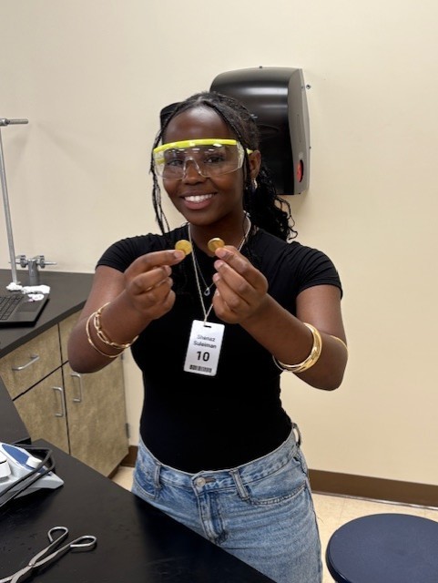 gold colored (brass) pennies