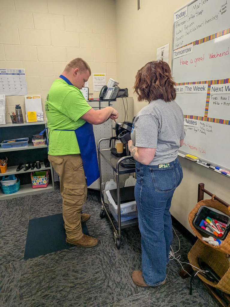 TLC student making coffee