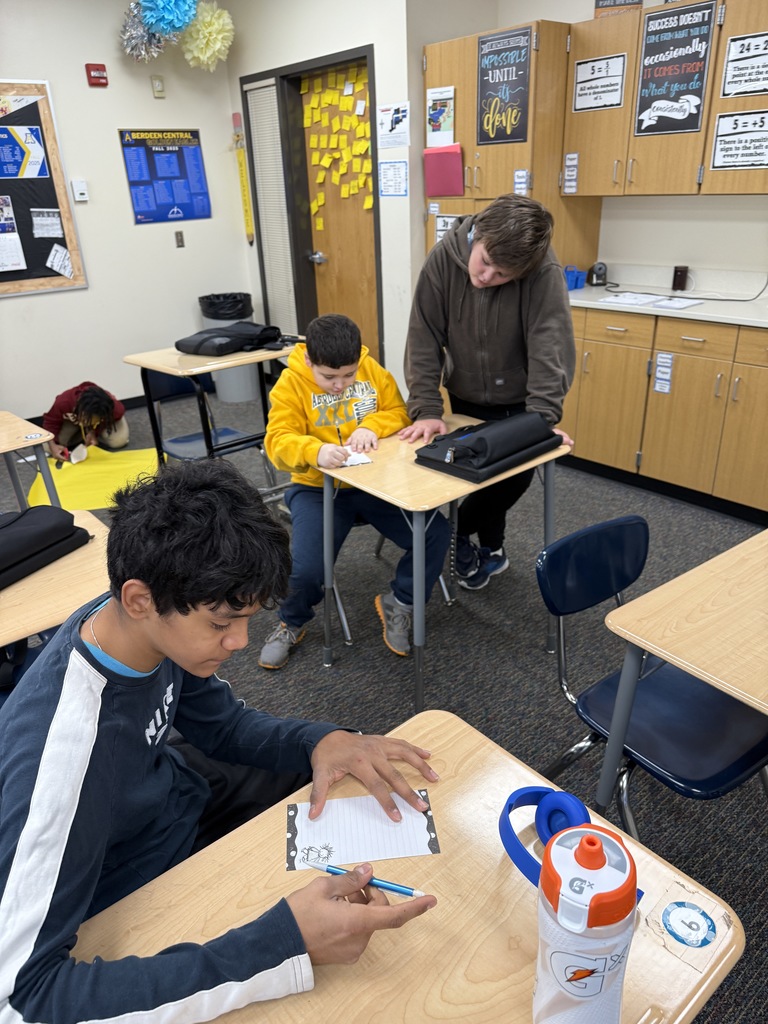 Writing kind notes to staff.