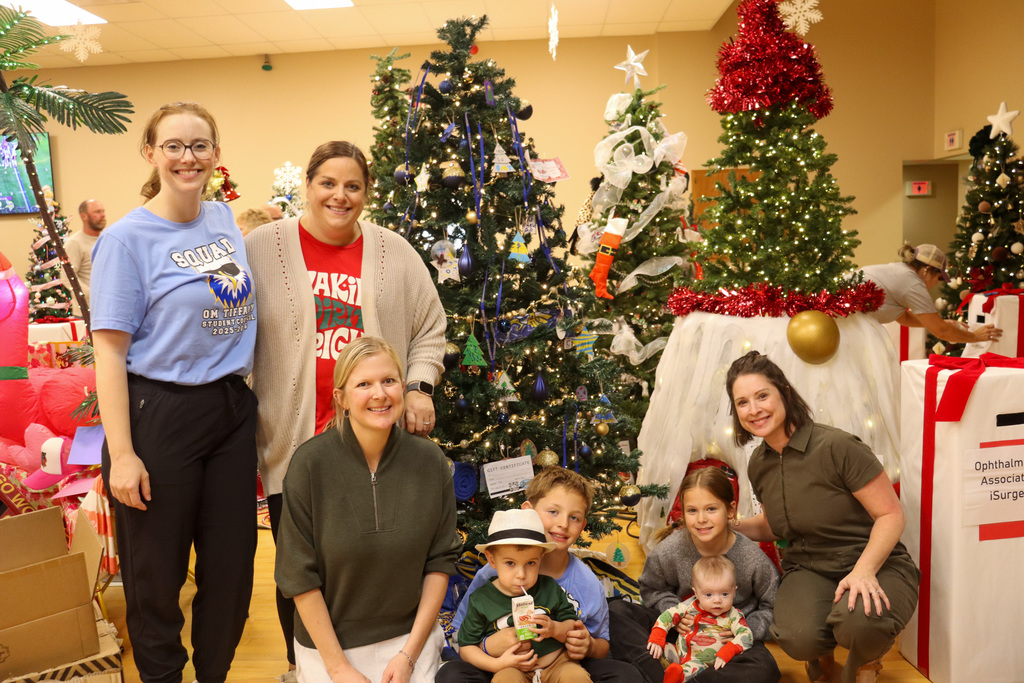 O.M. Tiffany students and teachers with the Golden Eagle tree at the Feztival of Trees