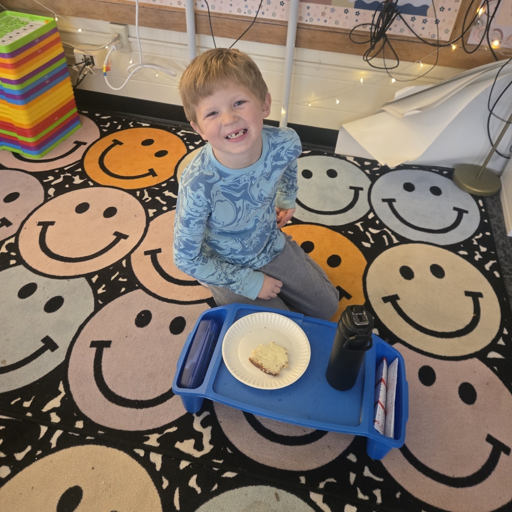 students eating bread with the butter they made!