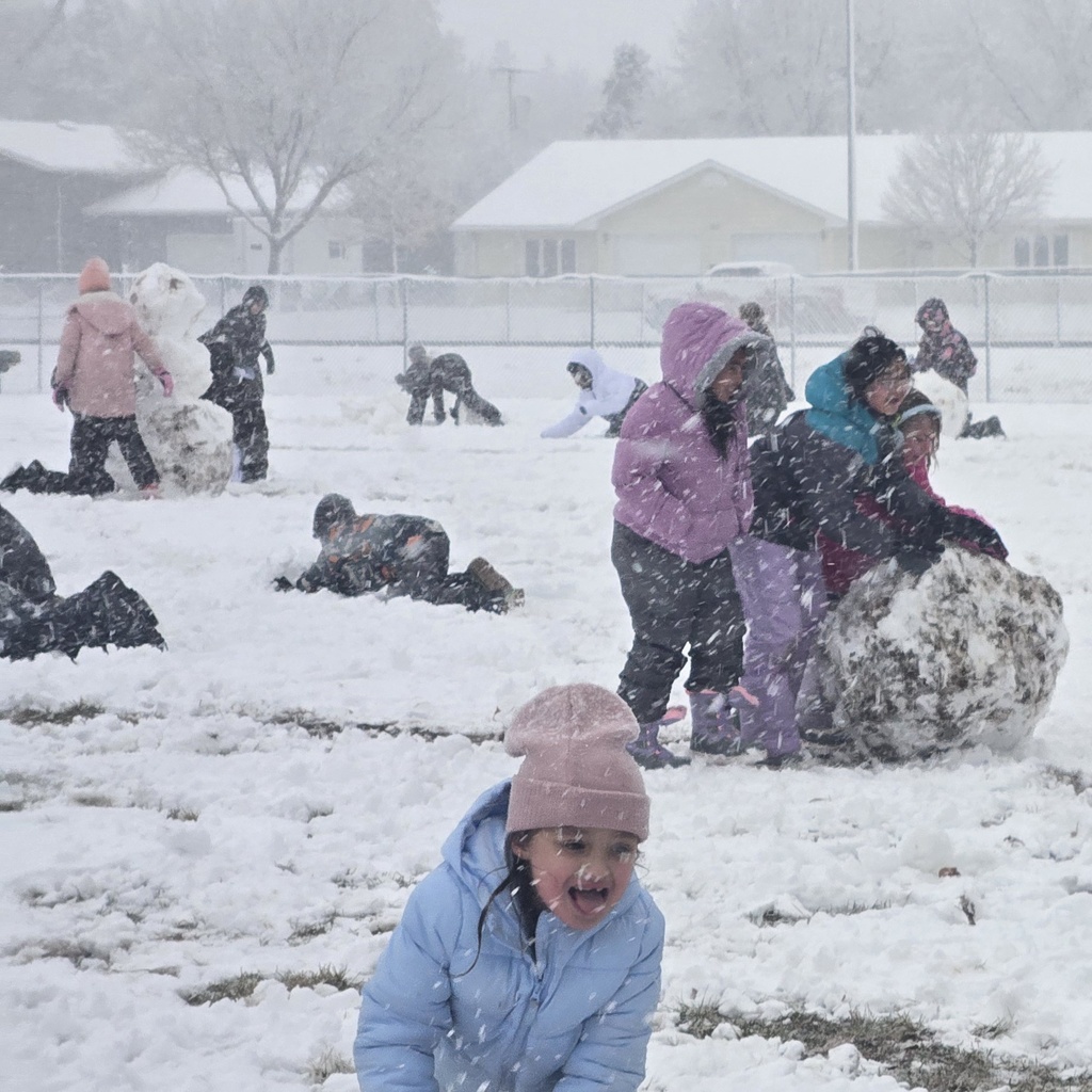 kids playing in snow