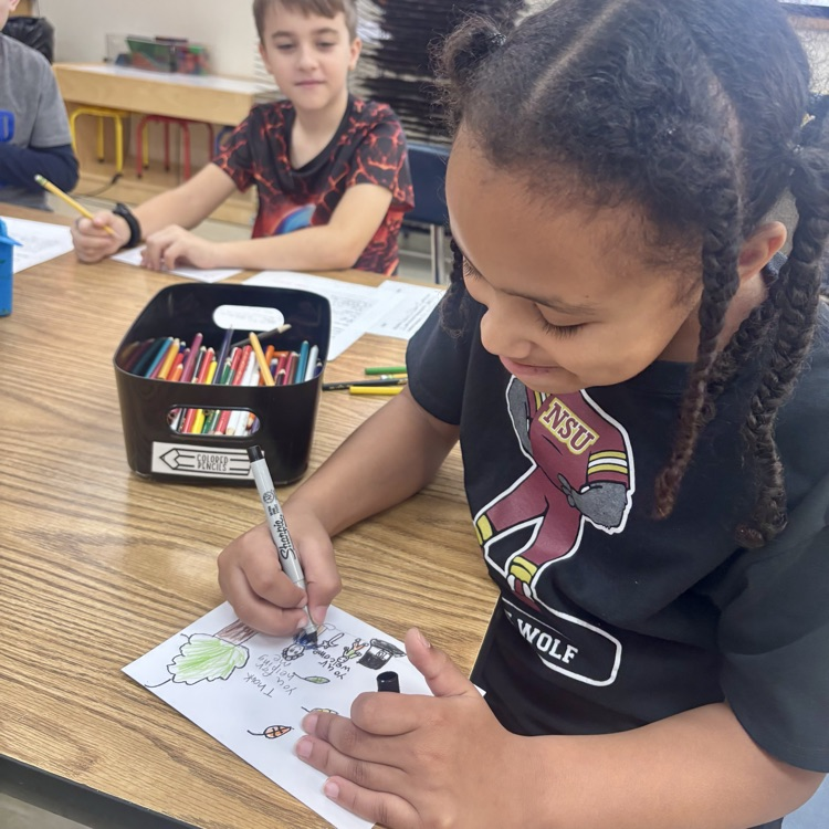 Student works on Thanksgiving card!