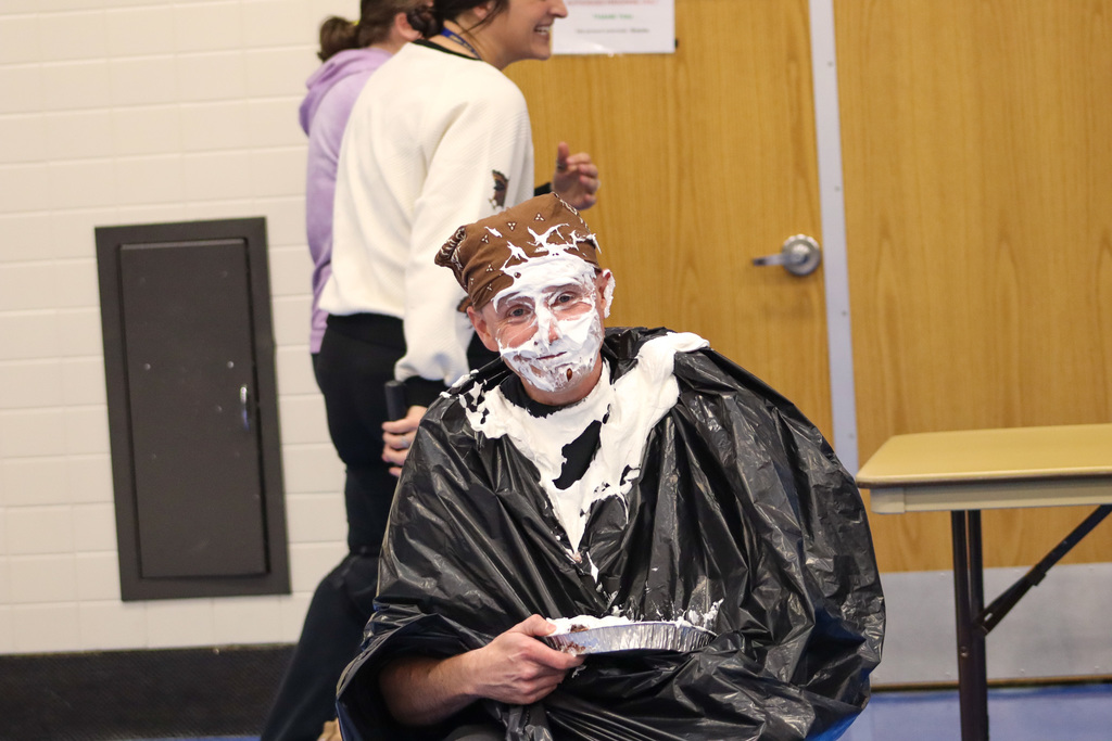 SRO Olson after getting a pie in the face at SMS