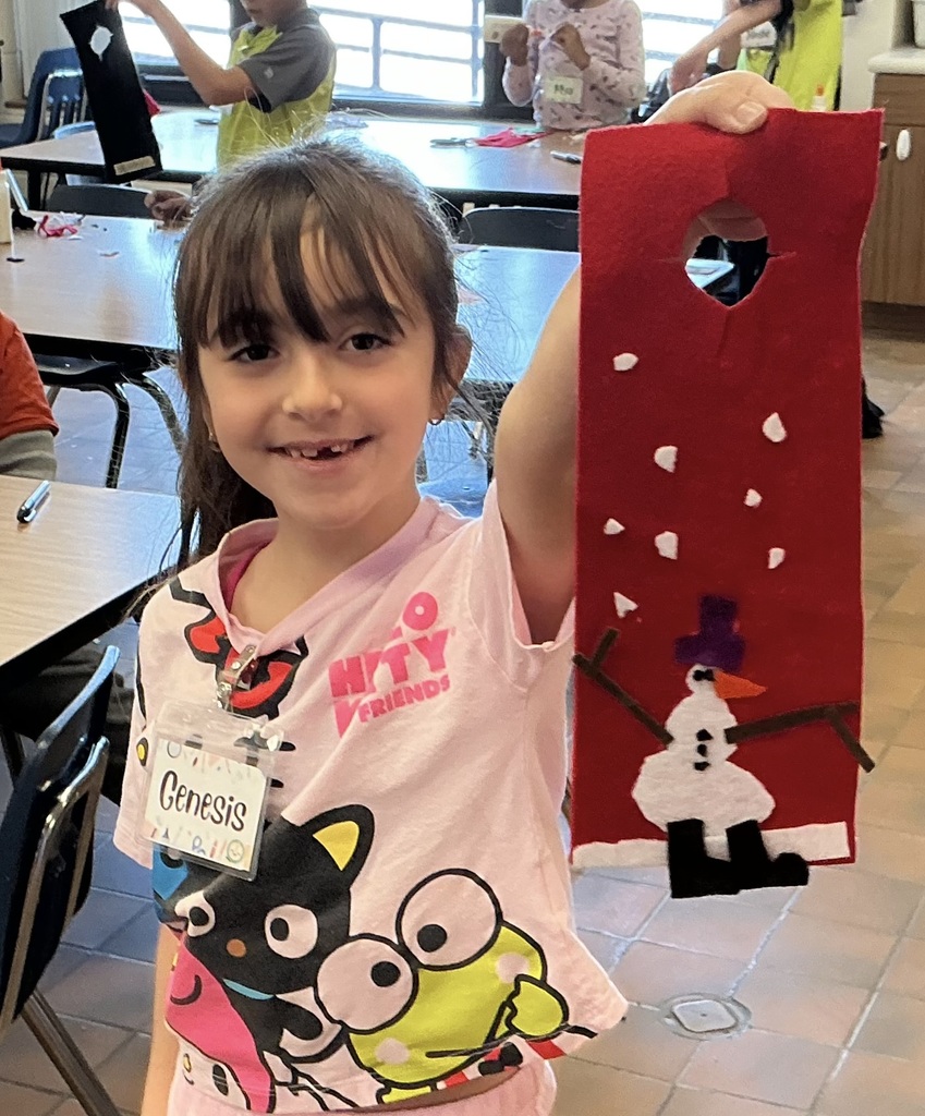Lincoln student with her  artwork