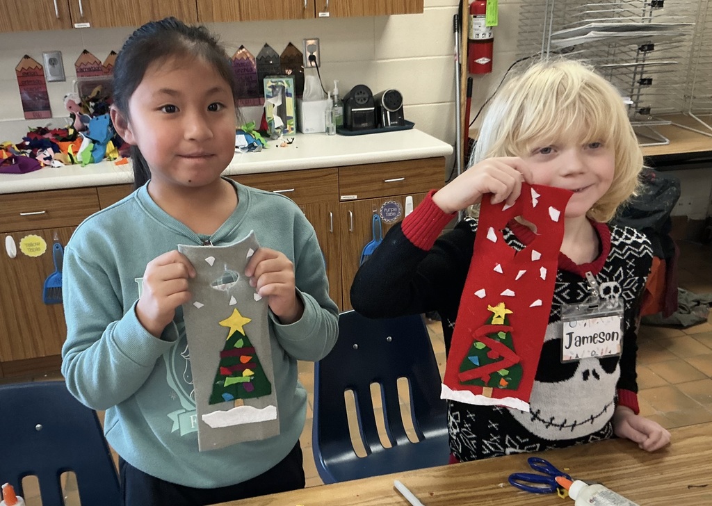 Lincoln students with their artwork