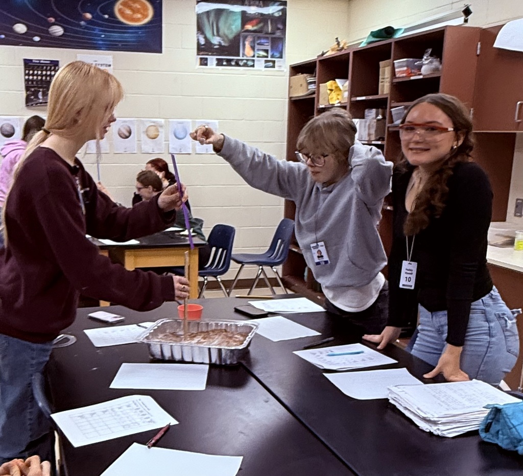 Testing how increasing drop height affects crater size in the lunar surface model.