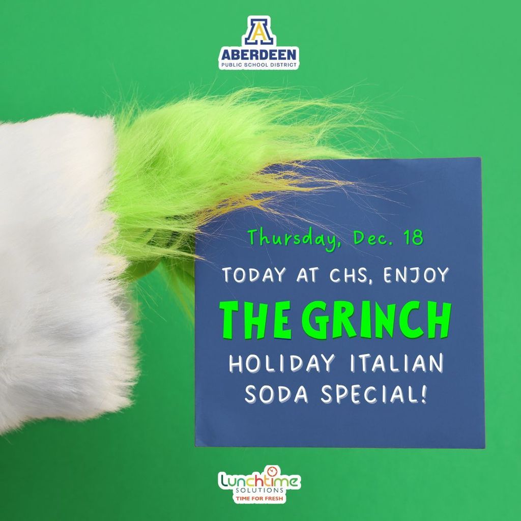 Grinch hand holding a sign about the Grinch holiday Italian soda special, Dec. 18