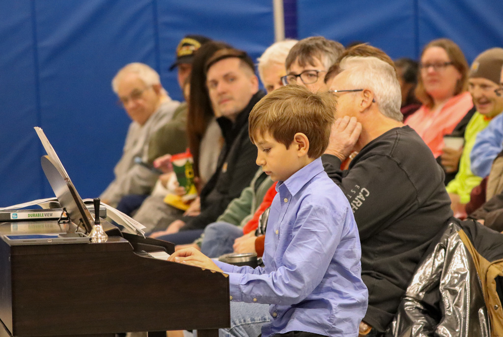 May Overby student performing at the winter program