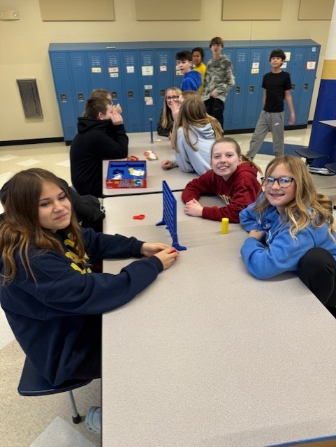 Students play connect four.