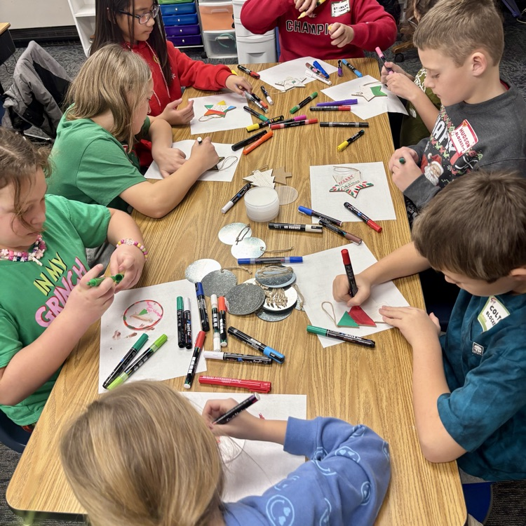 Students design their own snap bracelets and ornaments.