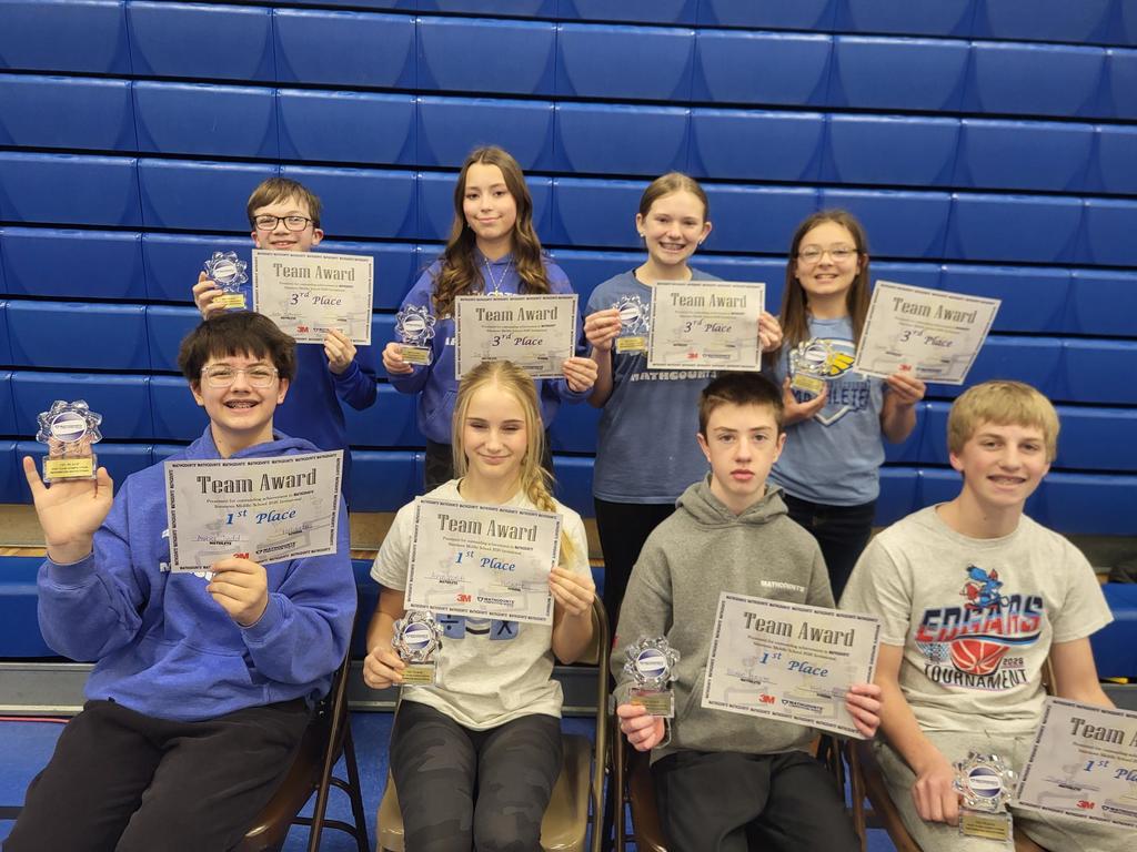 Front Row  Placing 1st in the team results:  Asher Judd, Avyn Waldo, Blake Hauge, Olund Swenson.  Back Row  3rd Place : Ayden Moffenbier, Gigi Golz, Ashlynn Madsen, Abigale Barton