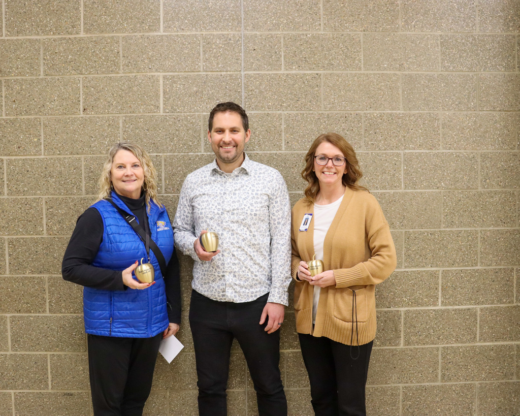 2026 Golden Apple Award winners Barb Nygaard, Erich Schaffhauser, and Dr. Tina Board.