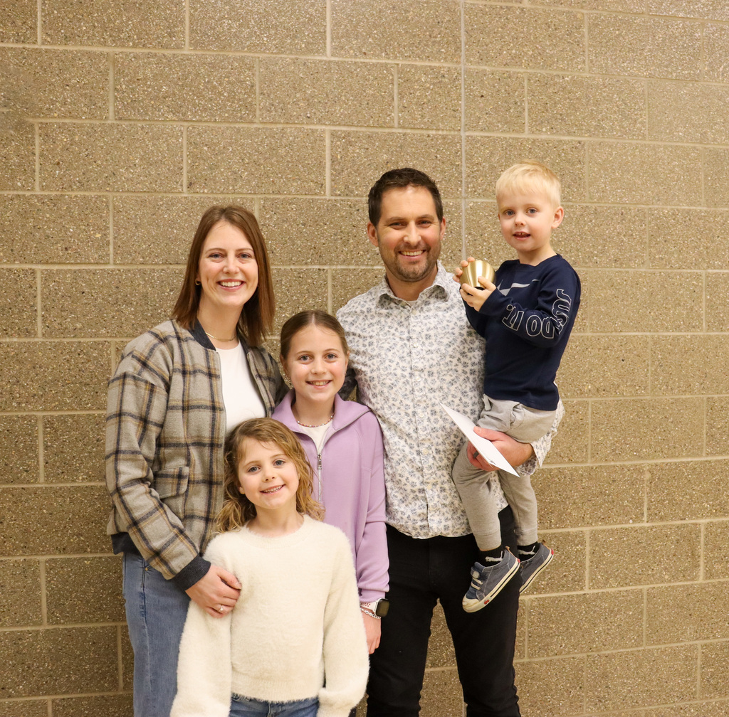 2026 Golden Apple Award winner Erich Schaffhauser with his family