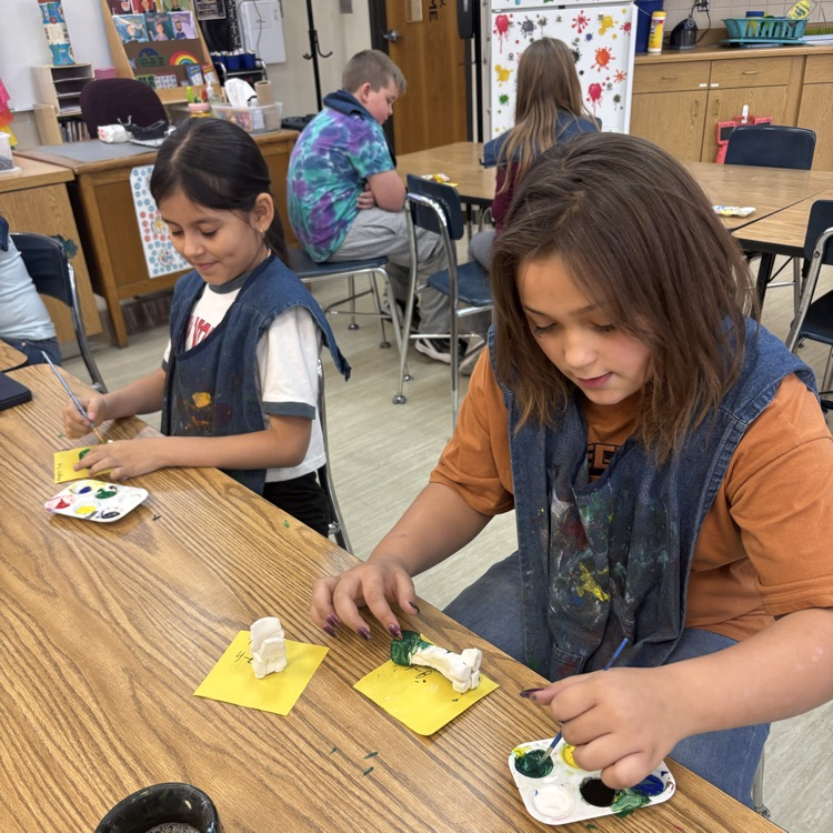 Students paint their Minecraft clay sculptures! 