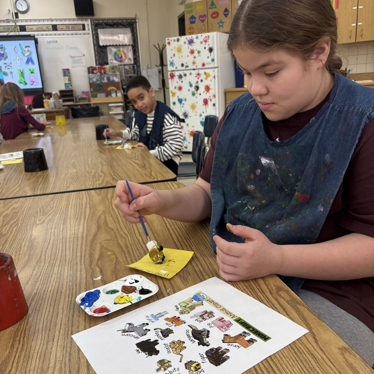 Students paint their Minecraft clay sculptures! 