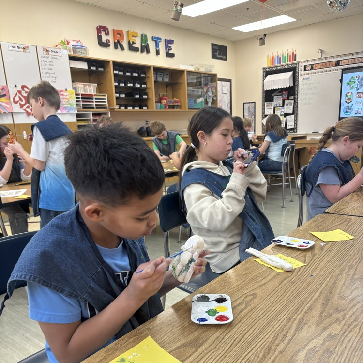 Students paint their Minecraft clay sculptures! 