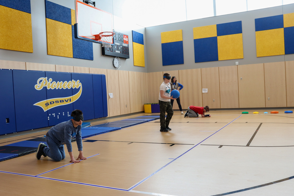 Students demonstrating Goal Ball at SDSBVI