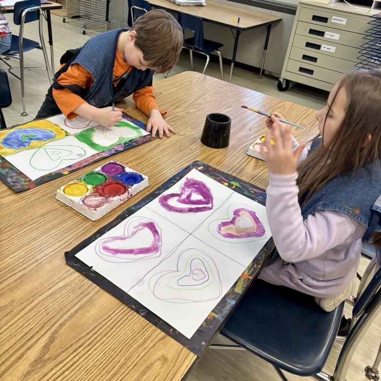 Students paint their heart designs!