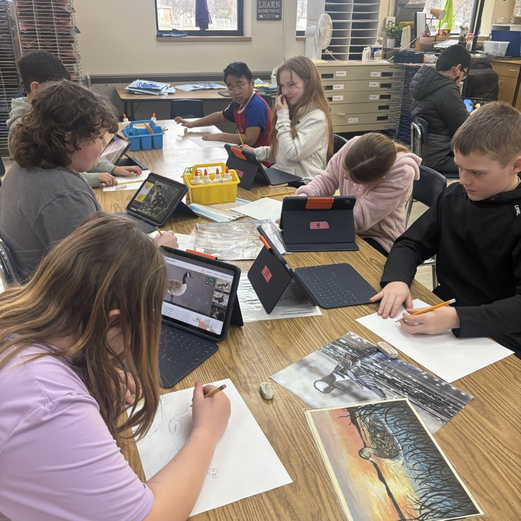 Students begin designing their own duck drawings.
