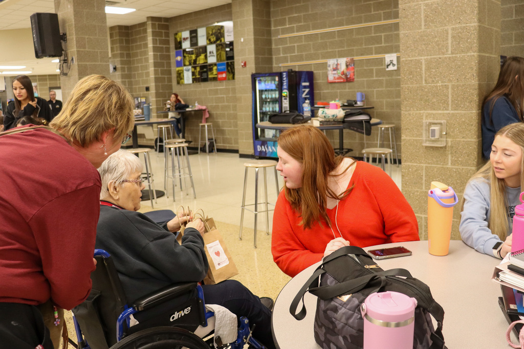 Primrose residents and staff handing out treat bags to CHS students
