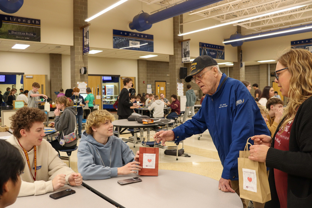 Primrose residents and staff handing out treat bags to CHS students