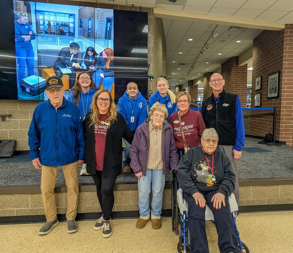 Primrose residents and staff handing out treat bags to CHS students