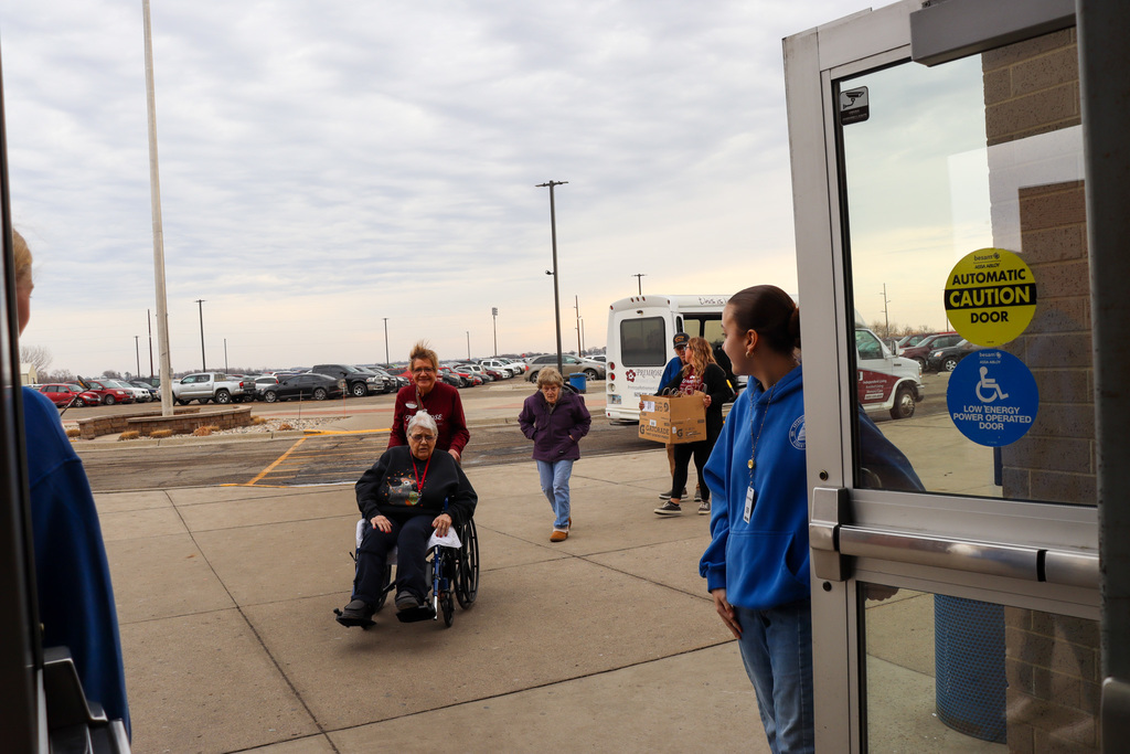Primrose residents and staff arriving at CHS