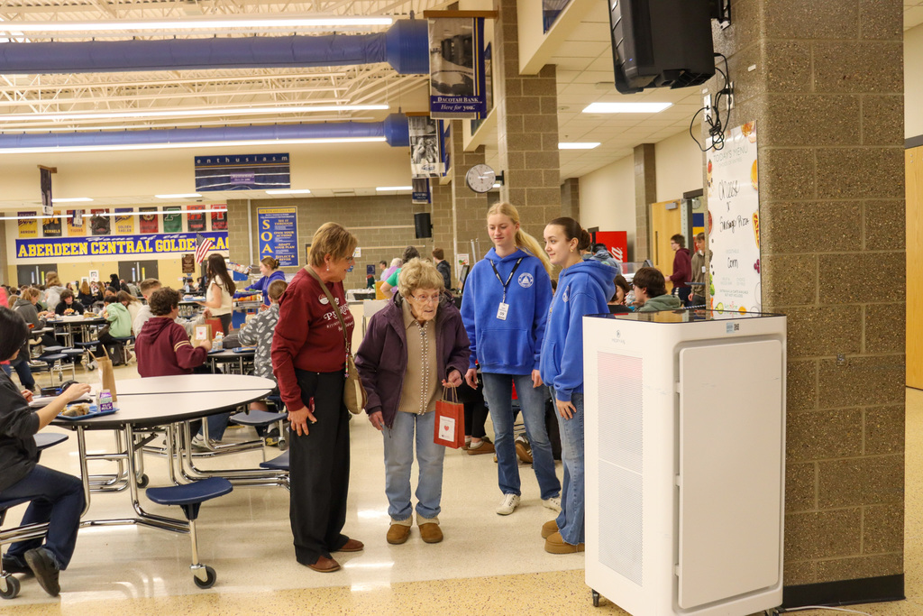 Primrose residents and staff handing out treat bags to CHS students