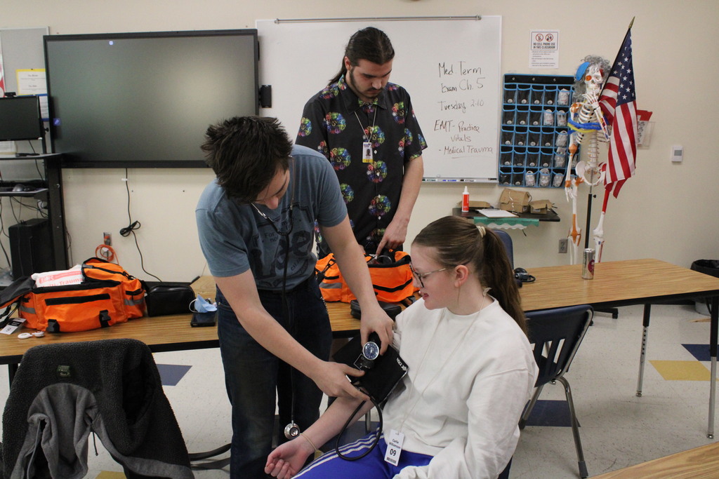 ATEC EMT students practicing vitals on other students