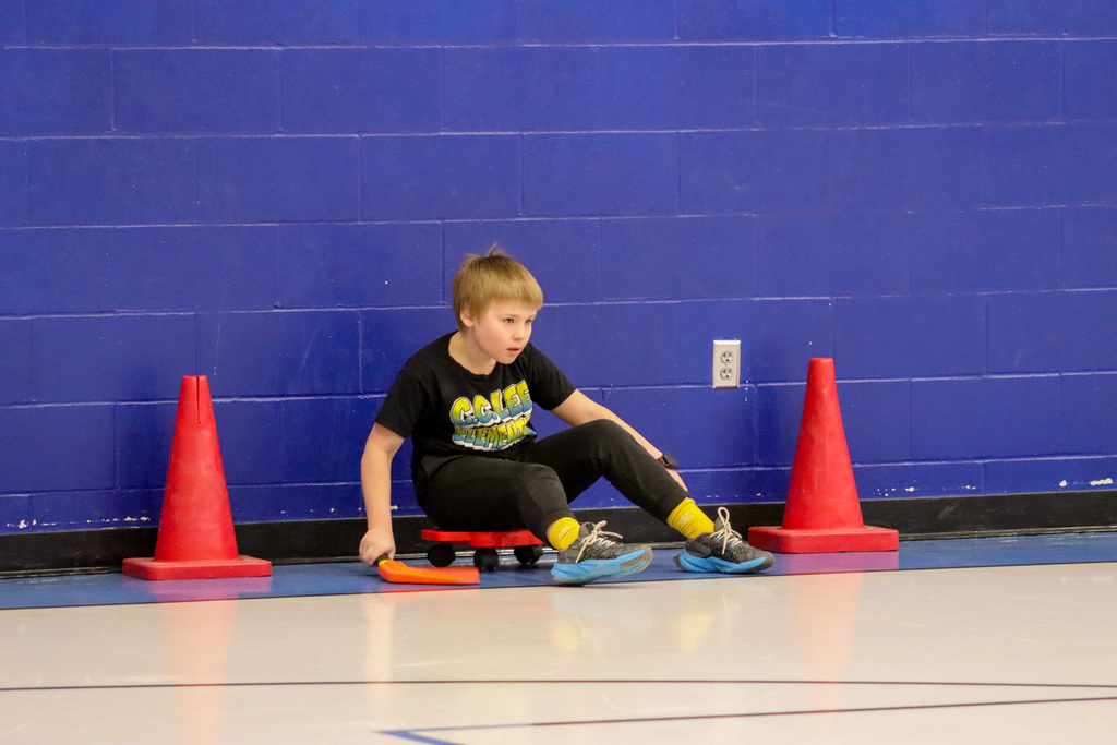 C.C. Lee student playing scooter hockey