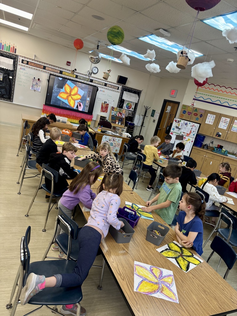 OMT first graders working on art