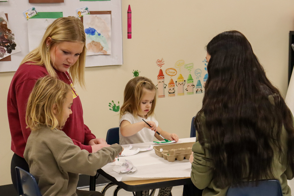 CHS students and children at Little Eagles Preschool