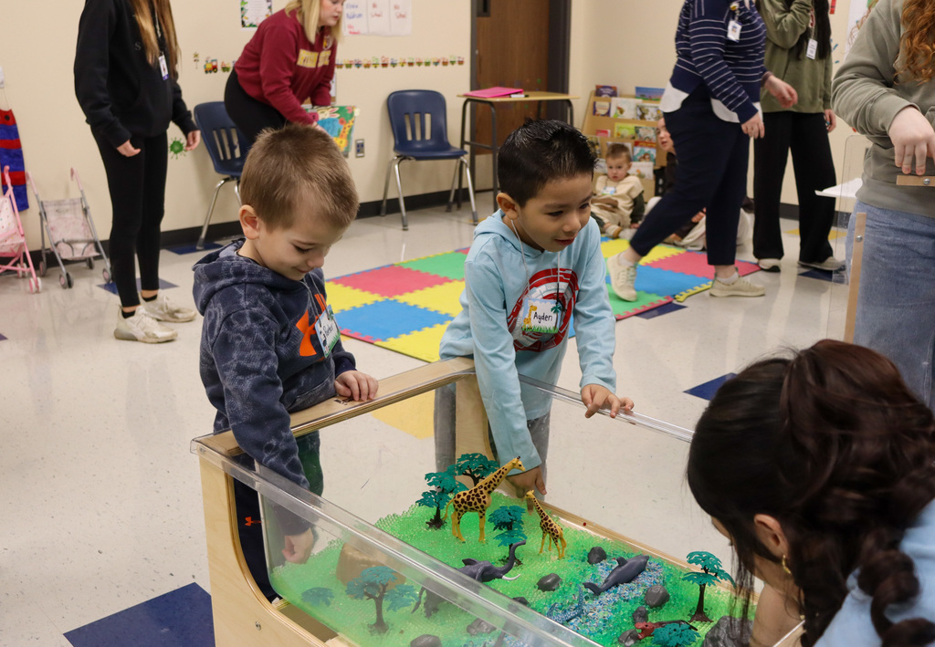 CHS students and children at Little Eagles Preschool