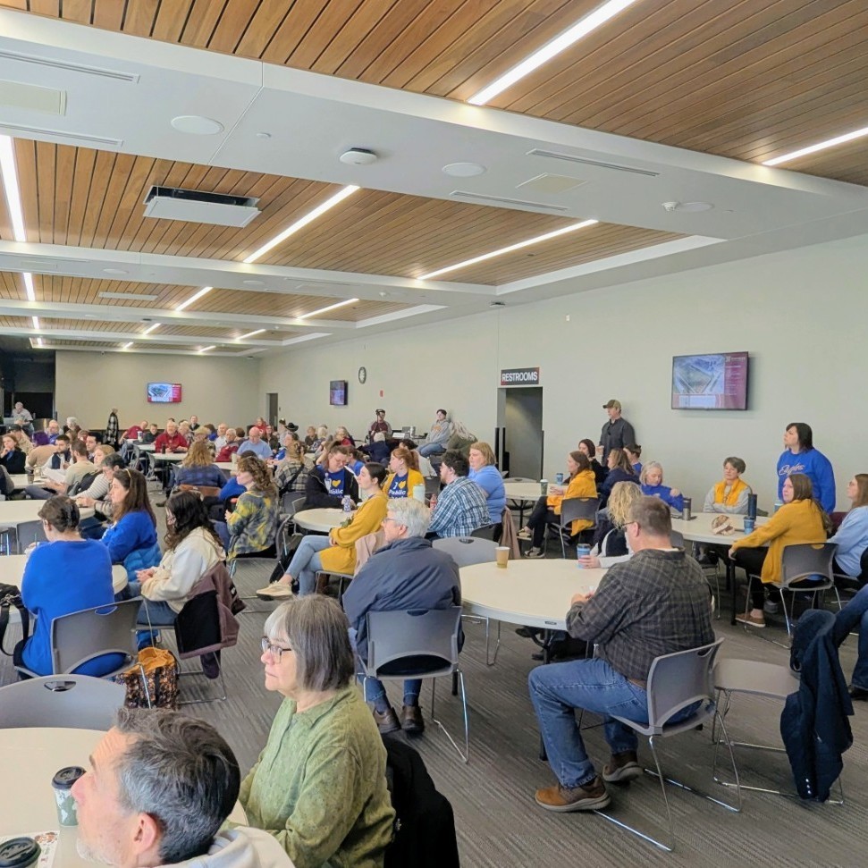 Aberdeen Public Schools representatives wearing blue and gold at the legislative coffee 