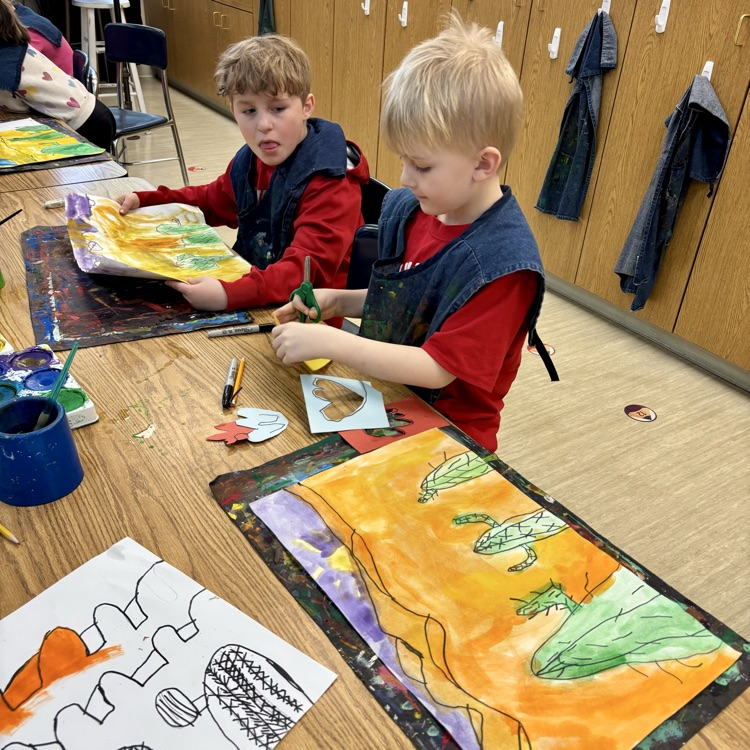First-graders work on their desert paintings.