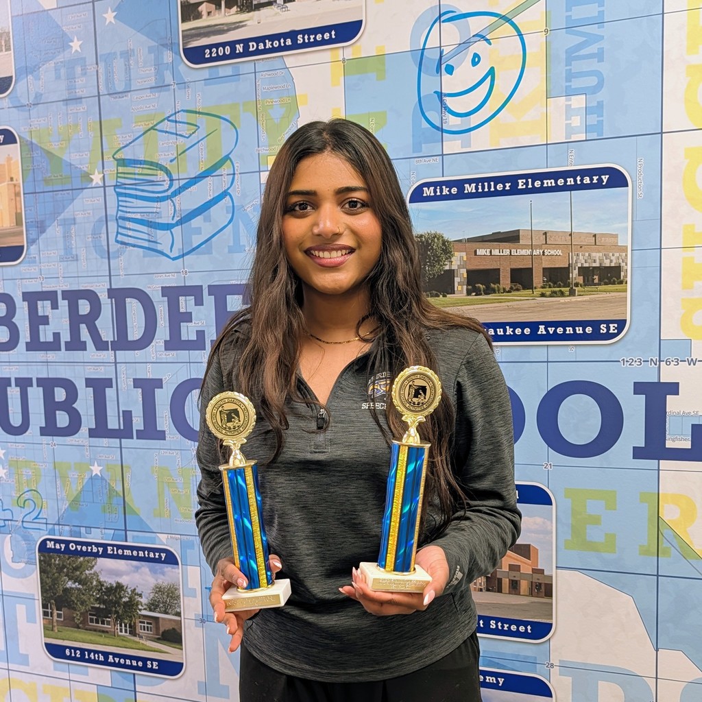 Amna George with her trophies
