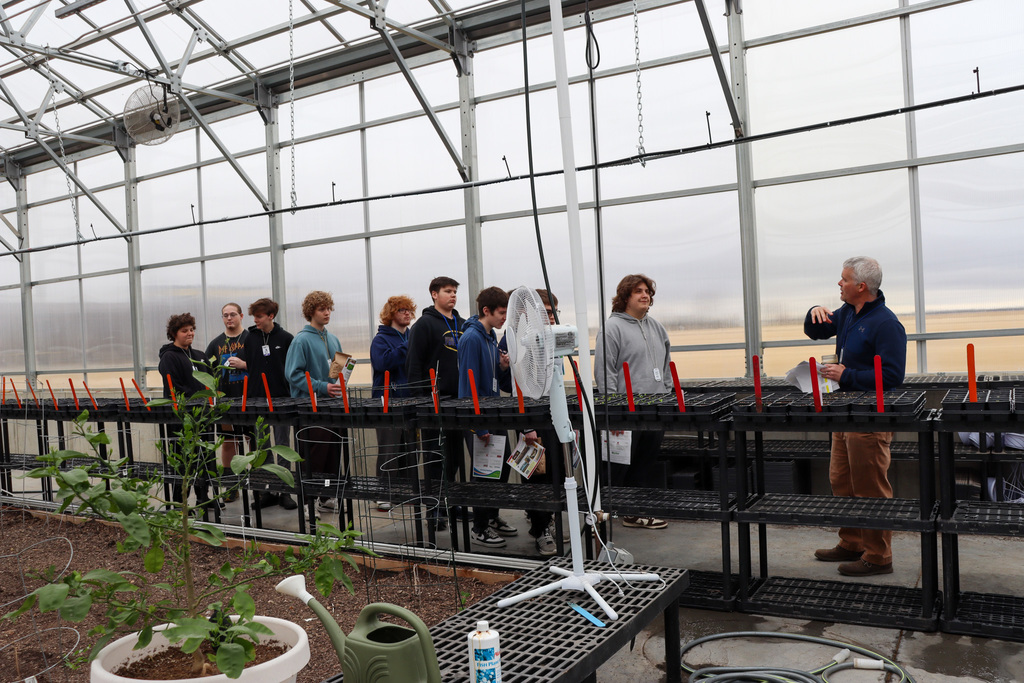 ATEC students touring the greenhouse at Career Connections event