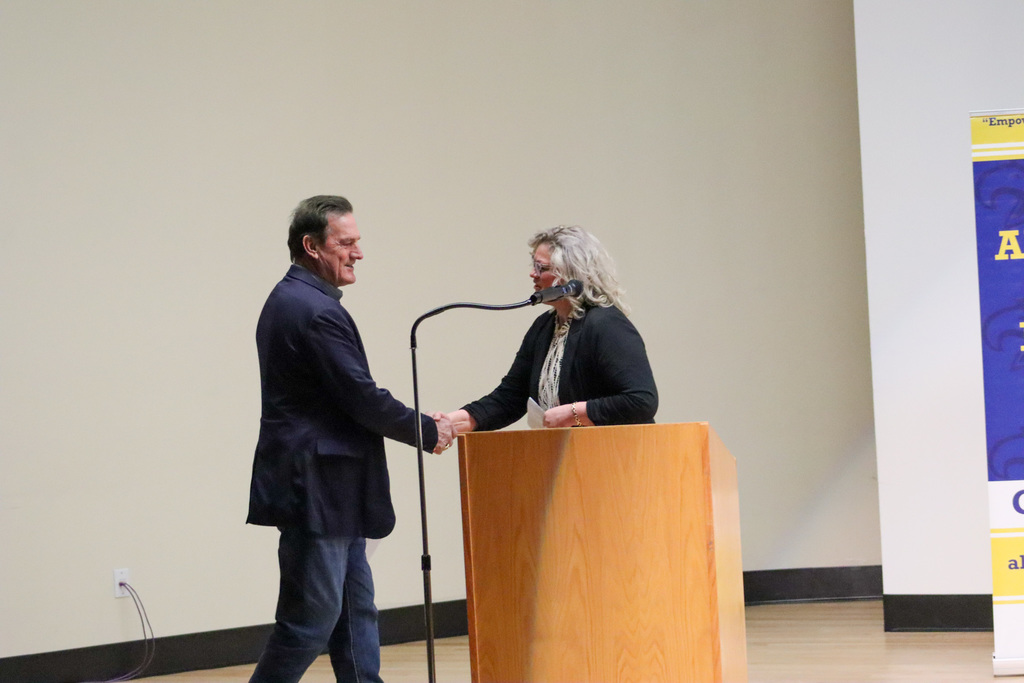 Gov. Rhoden shaking the hand of Assistant Superintendent Kaul