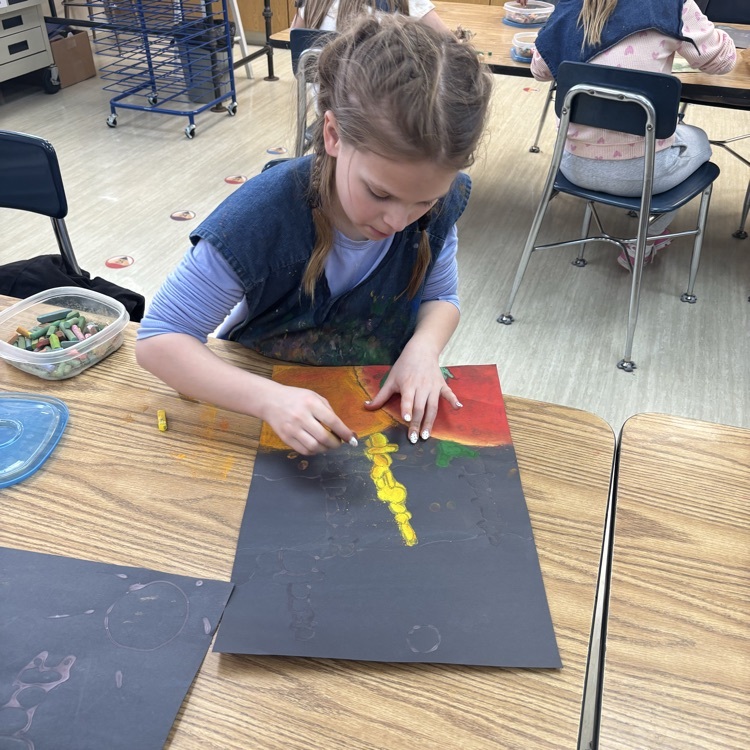 Students create chalk drawings!